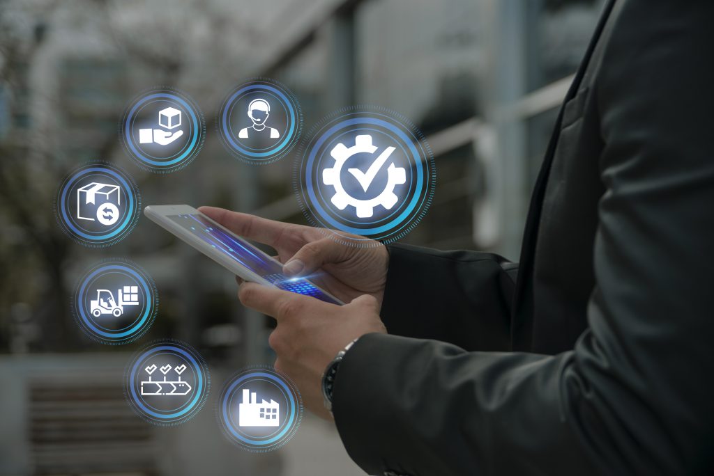 Freight broker course concept shown through logistics and supply chain icons on a digital tablet screen